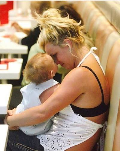 freebritney Britney Spears and her son, Sean Preston, at a cafe in New  York, May 2006. This photo is taken as Britney and her son are swarmed  relentlessly by paparazzi - she