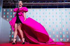 Nominees will have to show off their fashion at home, but presenters were still able to walk the red carpet in london. Baftas 2020 Florence Pugh Channels Little Pink Riding Hood