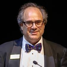 I'm directing a production of '12 Angry Jurors' at a small black box  theater in February. The set design issue is that I will be simultaneously  sharing the stage with a production