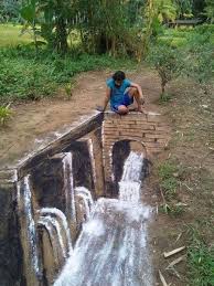 نظرا لعدم توفر الادوات استعمل هذا الفنان الفحم والطحين لرسم صورة ثلاثية الابعاد photo drawings street art