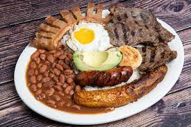 This colombian food favourite is very popular with colombian youth. Bandeja Paisa Digging Into Colombia S National Dish The Best Latin Spanish Food Articles Recipes Amigofoods