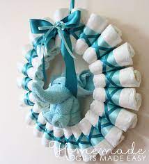 Diaper Wreath Instructions Rolled Diapers For Chic Style Baby Shower Crafts Baby Shower Wreath Diy Baby Shower Decorations