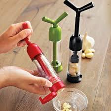 From small kitchen tools to countertop appliances, there is a large array of products to choose from when you're looking to upgrade your own kitchen or you're searching for the perfect gift for your favorite cook. Deliver Chopped Garlic With A Twist Cnet Cooking Gadgets Cool Kitchens Garlic Mincer