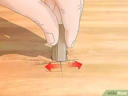 The easiest way is to colour them in! 3 Simple Ways To Fix Deep Scratches In Wood Wikihow
