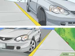 Turn front wheels to the curb. How To Park On A Hill 8 Steps With Pictures Wikihow