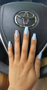 Light blue and silver nails look absolutely perfect. 20 Ideas Makeup Blue Silver Glitter Blue Glitter Nails Baby Blue Nails Baby Blue Nails With Glitter