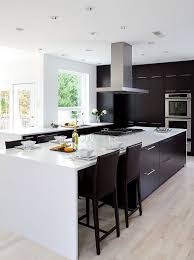 This stunning black and white kitchen is practically split in half: 34 Timelessly Elegant Black And White Kitchens Digsdigs