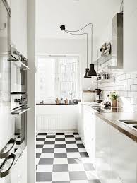 All things considered, black and white tiles are really flexible, offering minimalism or luxe to your interior design. Should We Do Black White Checkerboard Floors In Our Basement White Tile Kitchen Floor White Kitchen Floor White Kitchen Tiles