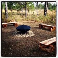 Consider a fire pit with several cozy chairs but a bench too. Log Benches Custom Made For Around An Outdoor Fire Pit Available Through Jennifer Taylor Design Ta Outdoor Fire Pit Diy Garden Furniture Fire Pit Landscaping
