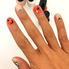 With watercolour swirls being all the rage in 2019, there is no other perfect way to pay homage to this trend than to try out watercolour blood swirls. 31 Halloween Nail Designs For The Costume Averse