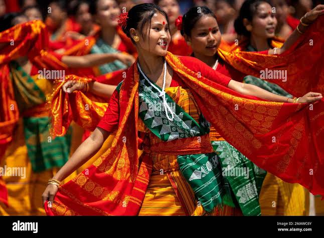 Tribal Bodo girls in traditional attire perform Sikhlai dance on Independence Day in Gauhati, northeastern Assam state, India, Monday, Aug. 15, 2022. The country is marking the 75th anniversary of its independence