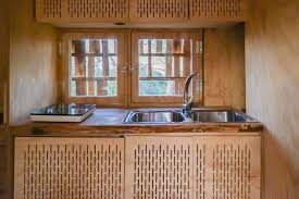 Tiny house kitchen with an island 10. The Niu Haus Tiny House By Iaac Students Is An Ecological Build