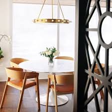 Knoll Saarinen Dining Table Muuto Cover Chairs In Oak With Cognac Leather Seats Photo By Courtney Molyneaux Saarinen Dining Table Saarinen Table Interior