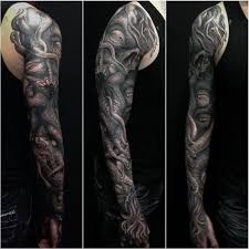 Black And White Upper Arm Half Sleeve Tattoos For Men Large Black And White Monster Arm Sleeve Tattoo Back Tattoos For Men Black Top And Jeans Black Background Cthulhu Tatuaggi Man