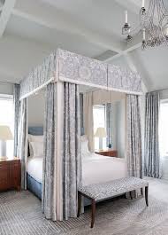 Matte black steel is an excellent foil for pink velvet. Powder Blue Canopy Bed With White And Blue Curtains Transitional Bedroom