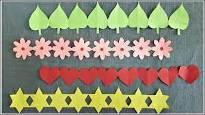 (via brit + co) 11. Easy Decorative Paper Chain Ideas Diy Paper Cutting Decorations Bulletin Board Borders Youtube