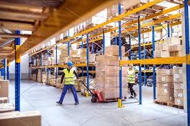 Warehouse Workers Pulling A Pallet Truck Warehouse Worker Warehouse Jobs Warehouse