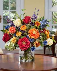 Nothing makes a family dining table feel more like home than a tasteful centerpiece. Mixed Silk Flower Bouquet Silk Flower Centerpieces Artificial Flower Arrangements Silk Flowers