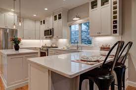 Kitchen Remodel With Peninsula For Seating And Island For Prepping Wine Storage Cubes An Peninsula Kitchen Design Kitchen Peninsula And Island Kitchen Remodel