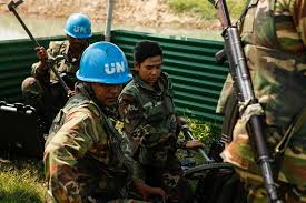U.N. peacekeepers from Bangladesh set up metal detectors