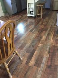 Quickstep Studio Spill Repel Restoration Oak 7 48 In W X 47 24 In L Embossed Wood Plank Laminate Flooring Lowes Com Laminate Flooring Colors Laminate Flooring Wood Planks