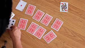 After everyone has hand a chance to stick or pass, the players turn up their chards and the player with the lowest card takes one of their stacks and places it into the pot. How To Play Garbage Card Game Rules And How To Win