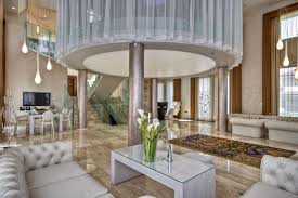 It literally floats on the large stone tile flooring, even though the dark color of the floor could tend to be a stark contrast to the white couch. 60 Stunning Modern Living Room Ideas Photos Designing Idea