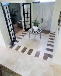 Wood and stone floor design can be a good idea for basements and garages but won't look appealing in a bedroom or a living room. Travertine Floor With Dark Emperador Border Design Done By Marble Unlimited Www Marbleunlimited Com Stone Floor Texture Granite Flooring Floor Design