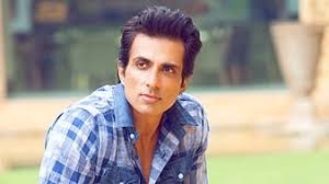 Sonu sood is an indian film actor, model, and producer who acts predominantly in hindi, telugu, and tamil films. Sonu Sood Is Wearing Blue White Checked Shirt In Blur Background Sonu Sood Hd Wallpaper Peakpx