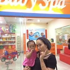 Cuddledry white with pink edging baby apron bath towel. Baby Spa