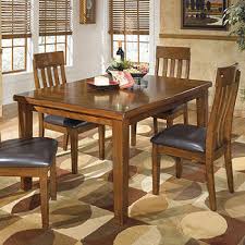 Dining chairs junior dining chairs upholstered chairs folding chairs dining chair underframes & seat shells chair covers chair pads. Signature Design By Ashley Essex 5 Pc Dining Color Md Brown Jcpenney