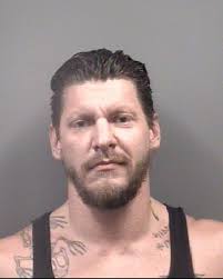 Retired Navy SEAL charged with possession of WMD