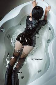 The reason for all the rapid blinking was this: Fully Clothed Tattooed Girl Get Soaking Wet In Bath Wetfoto Com