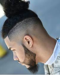 While the trend may have faded, it appears that these men's hairstyles are here to stay for a while. 2 Trendy Undercut Man Bun Hairstyle Men S Hairstyle Guide