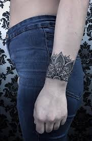 This black and gray thigh tattoo depicts a scorpion, composed of geometric shapes, over top of a circle created with a perforated line. 30 Best Mandala Tattoos Ideas For Both Men And Women Tattooed Martha