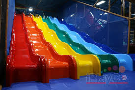 Rainbow Slide We Can Help You With Your Fec Development Let Us Create A Grea Commercial Indoor Playground Indoor Playground Equipment Playground Equipment