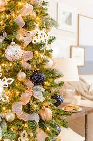 It is together both of these colors which make your holiday decoration task more exciting. Navy And Gold Christmas Tree Nick Alicia
