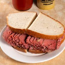 Slice both loaves of bread horizontally, like a sandwich. Katz S Corned Beef Sandwich Shipped Catered Delivered