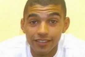 Ex-youth worker jailed over gun threat