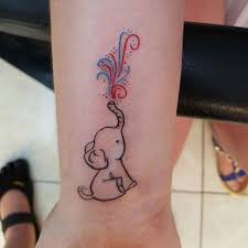 They symbolize good luck (trunk up); 40 Significant And Tiny Elephant Tattoo Designs
