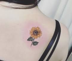 Daisies represent innocence and purity, while sunflowers symbolize devotion and joy. Beautiful Sunflower Tattoo On Back By Tattooist Ara Kickass Things