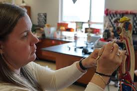 This week is Teacher Appreciation Week, and we'd like to take this time  celebrate our great teachers at Jeffersonville High School! Our first  teacher we'd like to spotlight is Ms. Woods! Years