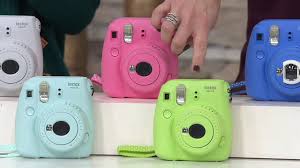 Four settings' buttons on one of the longer sides (mode. Instax Mint Promotions