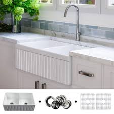 Browse sinkology farmhouse kitchen sinks to find the perfect style for your home. Luxury 33 Inch Pure Fireclay Modern Farmhouse Kitchen Sink In White Double Bowl Fluted Front Includes Drains 2 And Grids 2 Fsw1006 By Fossil Blu Buy Online In Bahamas At Bahamas Desertcart Com Productid 127421517
