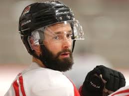 Dinos' men face another stern hockey test