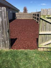 Dog Pen At Veterinary Clinic Is Using Our Rubber Mulch For Ground Cover No More Mud It S Cleaner And Lasts Lo Dog Backyard Outdoor Dog Area Backyard Dog Area
