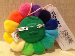 He works in fine arts media (such as painting and sculpture) as well as commercial media (such as fashion, merchandise, and animation) and is known for blurring the line between high and low arts. Takashi Murakami Plush Smiling Rainbow Flower Pin Authentic Kaikai Kiki Corp Nib 1810603052