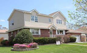 Ideally the addition's roof lines should match and extend the existing roof. Baldwin Ny Second Floor Addition On A Ranch