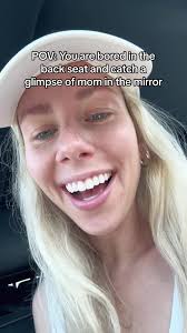 Baby Looking at Moms Face in Car Seat