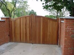 A Wooden Gate In Craftsman Style Wooden Gates Wooden Fence Gate Wooden Gate Designs